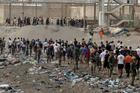 FILE PHOTO: Migrants cross into the Spanish enclave of Ceuta
