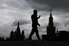 A man walks along Red Square in Moscow