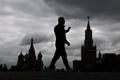 A man walks along Red Square in Moscow