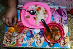 The Wider Image - From hunger to obesity: Developing world faces growing threat to child health