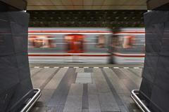 Motion,Blur,Of,Subway,Train,Entering,Station,On,The,Prague