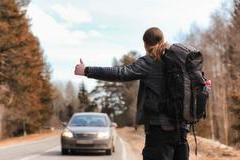 A,Young,Man,Is,Hitchhiking,Around,The,Country.,The,Man