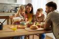 Happy,Little,Girl,Pouring,Milk,Into,Bowl,Of,Cereals,While