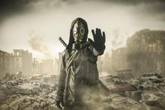 Man,In,Gas,Mask,Says,Stop,The,Destruction,In,The
