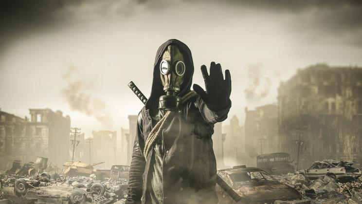 Man,In,Gas,Mask,Says,Stop,The,Destruction,In,The