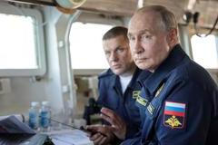 Russian President Vladimir Putin observes a military drill of Pacific fleet in Sakhalin region