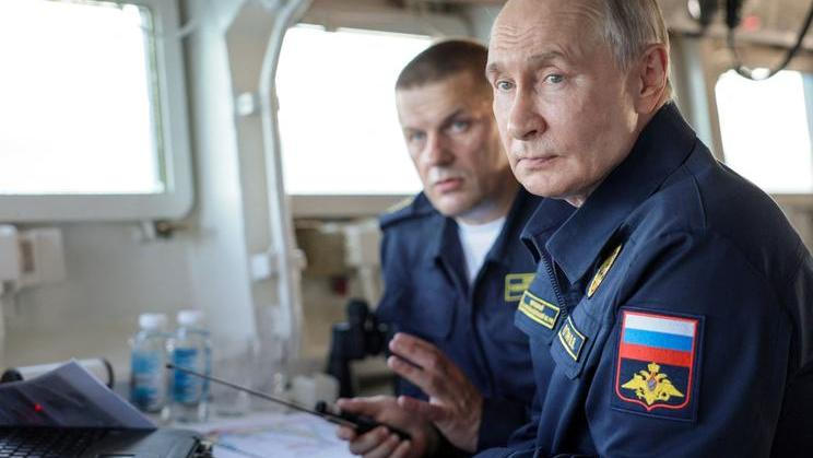 Russian President Vladimir Putin observes a military drill of Pacific fleet in Sakhalin region