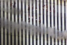 PEOPLE SIT IN WINDOWS AT THE WORLD TRADE CENTER BEFORE COLLAPSE.