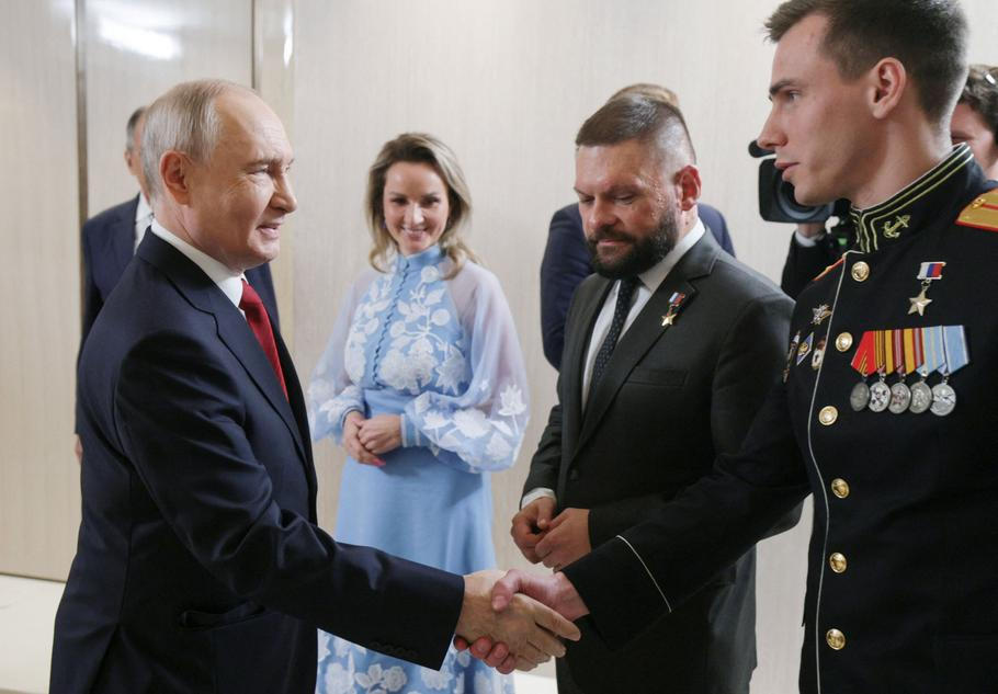 Russian President Vladimir Putin meets with the top five candidates on United Russia's party list for the State Duma election, in Moscow