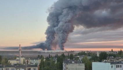 Smoke rises from the Ozon warehouse following a Ukrainian drone attack, according to the regional governor