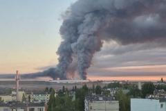 Smoke rises from the Ozon warehouse following a Ukrainian drone attack, according to the regional governor