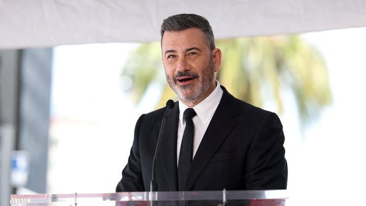 FILE PHOTO: Adam Carolla unveils his star on the Hollywood Walk of Fame in Los Angeles