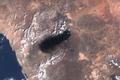 A satellite image shows black smoke rising from an area of Saudi Arabia’s East-West oil pipeline south of Medina