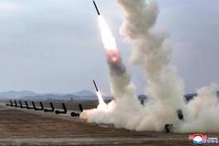 North Korean leader Kim oversees test-launch of multiple rocket launchers
