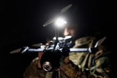 FILE PHOTO: Ukrainian serviceman prepares for a fly an FPV interceptor drone during his combat shift in Kharkiv region