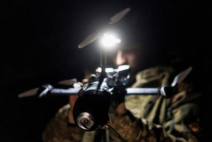 FILE PHOTO: Ukrainian serviceman prepares for a fly an FPV interceptor drone during his combat shift in Kharkiv region