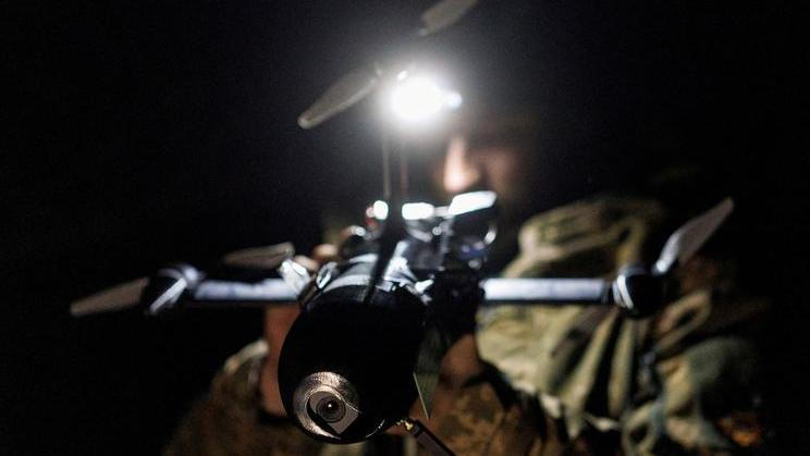 FILE PHOTO: Ukrainian serviceman prepares for a fly an FPV interceptor drone during his combat shift in Kharkiv region