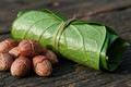 Close-up,Of,Betel,Nuts,And,Fresh,,Rolled,Betel,Leaves,Tied