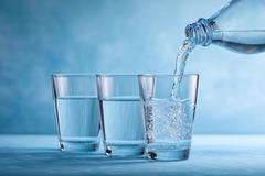 A,Close-up,Shot,Shows,Clear,Water,Being,Poured,From,A