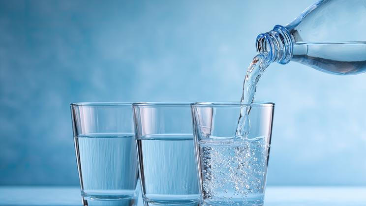 A,Close-up,Shot,Shows,Clear,Water,Being,Poured,From,A