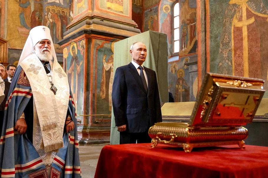 FILE PHOTO: Russian President Vladimir Putin visits the Archangel Cathedral of the Kremlin in Moscow