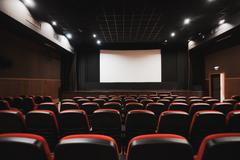 Empty,Cinema,Auditorium,With,Rows,Of,Red,And,Black,Seats
