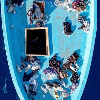 Drone view of an empty migrant boat after rescue in the central Mediterranean