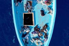 Drone view of an empty migrant boat after rescue in the central Mediterranean