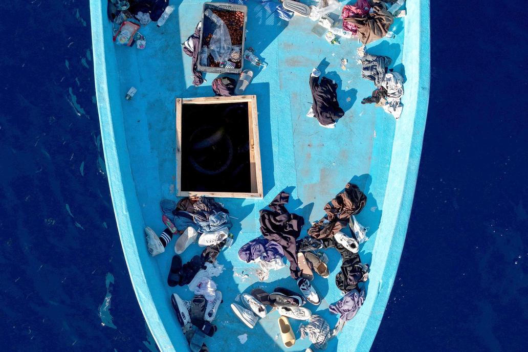 Drone view of an empty migrant boat after rescue in the central Mediterranean