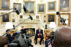 U.S. President Trump greets lifeguard Ryder Williams, who saved a child off the coast of Santa Cruz, at the White House in Washington