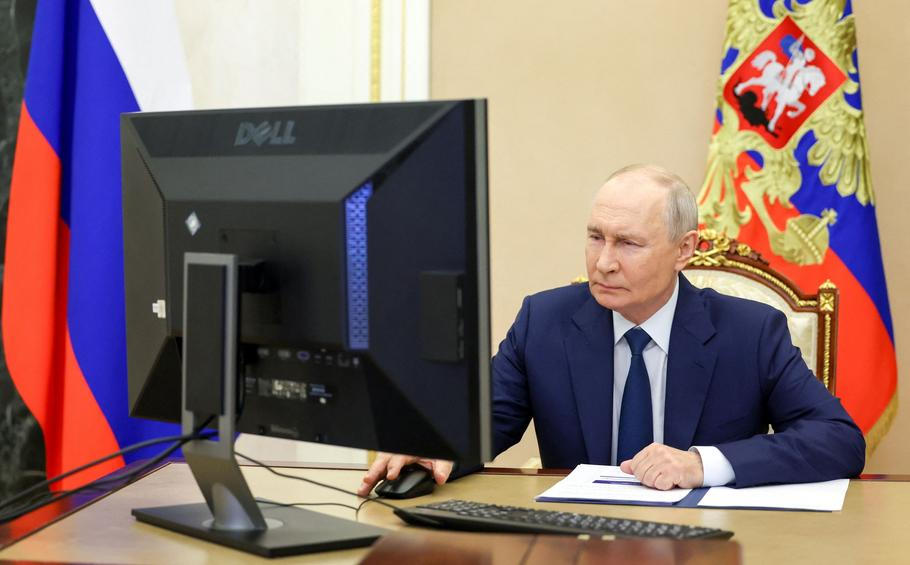 Russian President Putin votes online in the parliamentary election in Moscow