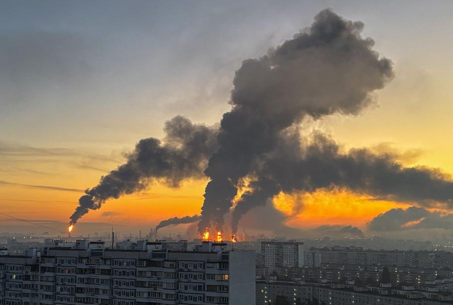 Plumes of smoke rise from fires (centre) at an oil refinery following what the authorities say is a Ukrainian drone strike in the course of the Russia-Ukraine conflict, in Moscow