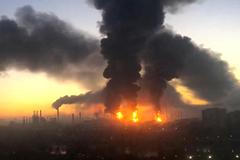Smoke columns rise after strikes in oil refinery in Moscow, Russia