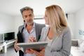Real-estate,Agent,With,Client,Visiting,Modern,House