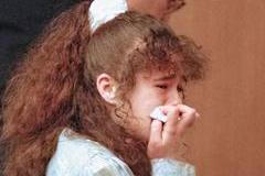 Christa Pike is escorted from Knox County Criminal Court in Knoxville, Tennessee