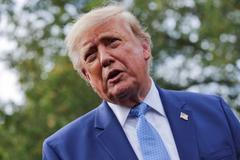 US President Donald Trump speaks to the media at the White House driveway following a luncheon for tech leaders in the East Room, in Washington