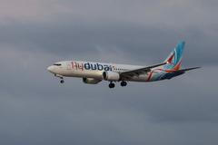 Passengers from a FlyDubai flight to Israel from United Arab Emirates that was diverted to Saudi Arabia after an emergency signal arrive at Ben Gurion International Airport