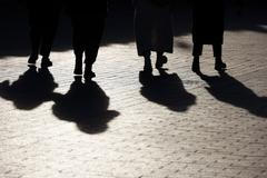 Black,Silhouettes,And,Shadows,Of,People,On,The,Street.,Women