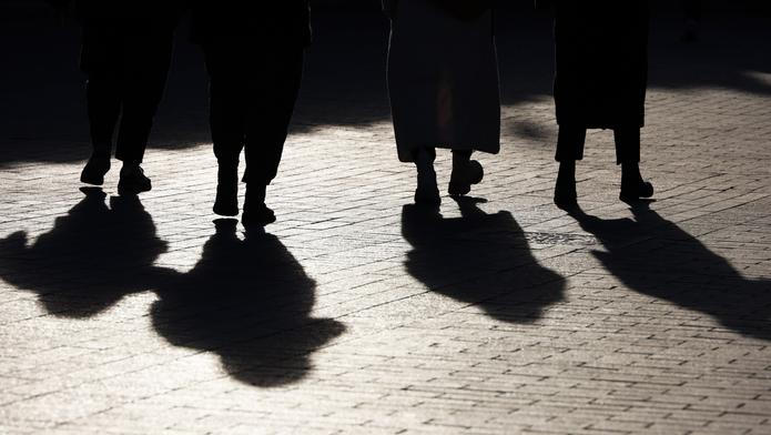 Black,Silhouettes,And,Shadows,Of,People,On,The,Street.,Women