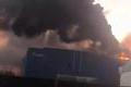 FILE PHOTO: Smoke billows from Yandex's Sasovo hub, following a drone strike
