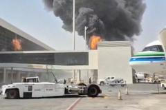 FILE PHOTO: Smoke and flames rise from King Khalid Airport, after Yemen's Iran-backed Houthis said they attacked the airport, in Riyadh