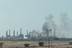 FILE PHOTO: Smoke rises from a fire at the Aramco refinery south of Riyadh