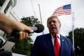 US President Donald Trump departs White House as he travels en route to rally in Georgia