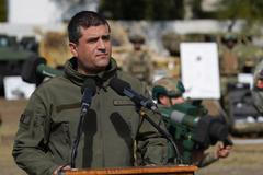 Romanian Interim Minister of Defence Radu Miruta speaks during MOBEX B-IF-26 exercise